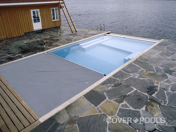 <div class='closebutton' onclick='return hs.close(this)' title='Close'></div><div class='firstH'><img src='/images/logo-white-small.png'></div><h1>Pool Cover</h1><p>Pool Cover #005 by Aquatech Pools by CHI</p><div class='getSocial'><h1>Share</h1><p class='photoBy'>Photo by Aquatech Pools by CHI</p><iframe src='http://www.facebook.com/plugins/like.php?href=http%3A%2F%2Fchipool.com%2Fimages%2Fgalleries%2Fpool-covers%2Fwm%2Fpool-cover-by-aquatech-pools-by-chi-005.jpg&send=false&layout=button_count&width=100&show_faces=false&action=like&colorscheme=light&font&height=21' scrolling='no' frameborder='0' style='border:none; overflow:hidden; width:100px; height:21px;' allowTransparency='true'></iframe><br><a href='http://pinterest.com/pin/create/button/?url=http%3A%2F%2Fwww.chipool.com&media=http%3A%2F%2Fwww.chipool.com%2Fimages%2Fgalleries%2Fpool-covers%2Fwm%2Fpool-cover-by-aquatech-pools-by-chi-005.jpg&description=Pools' data-pin-do='buttonPin' data-pin-config='above'><img src='http://assets.pinterest.com/images/pidgets/pin_it_button.png' /></a></div>